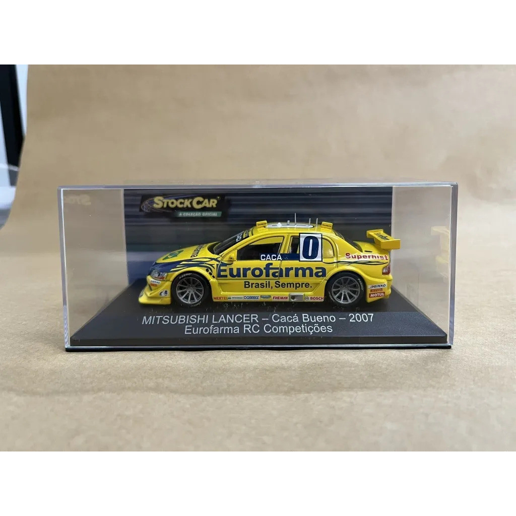 Miniatura Mitsubishi Lancer - Cacá Bueno - 2007 1:43 Ixo Amarelo