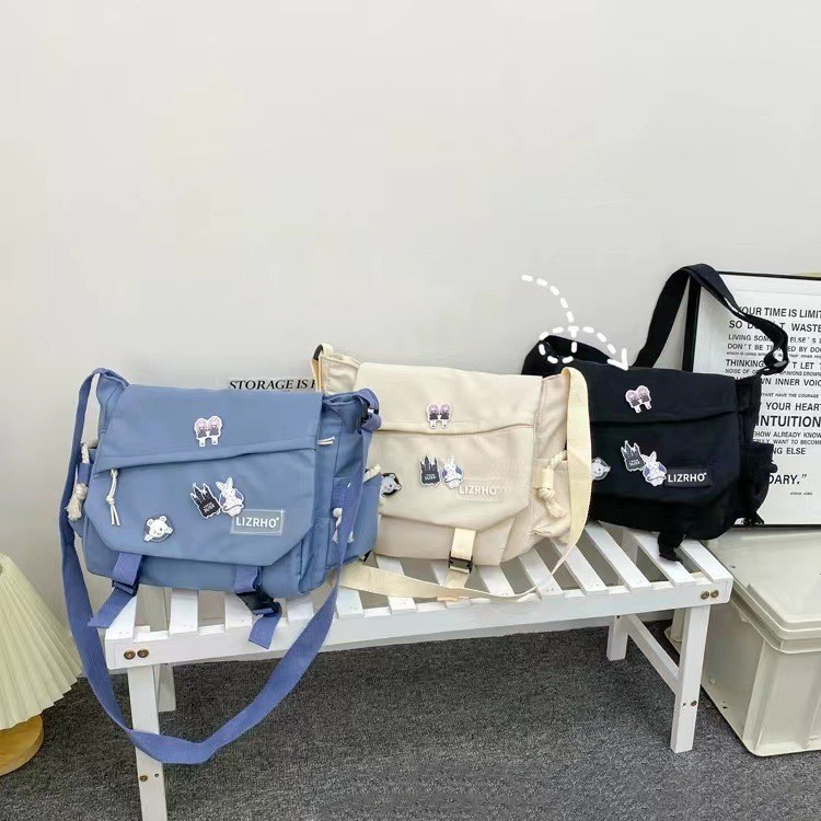 🎁Bolsa de Ombro Unissex de Grande Capacidade Estilo Coreano Bolsa Transversal de Nylon Retro e Elegante