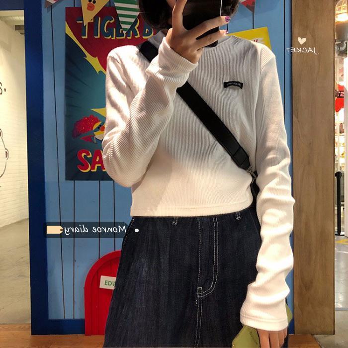 Camisa de fundo branca feminina primavera outono roupa interior 2021 novo estilo doce quente menina Design de manga comp