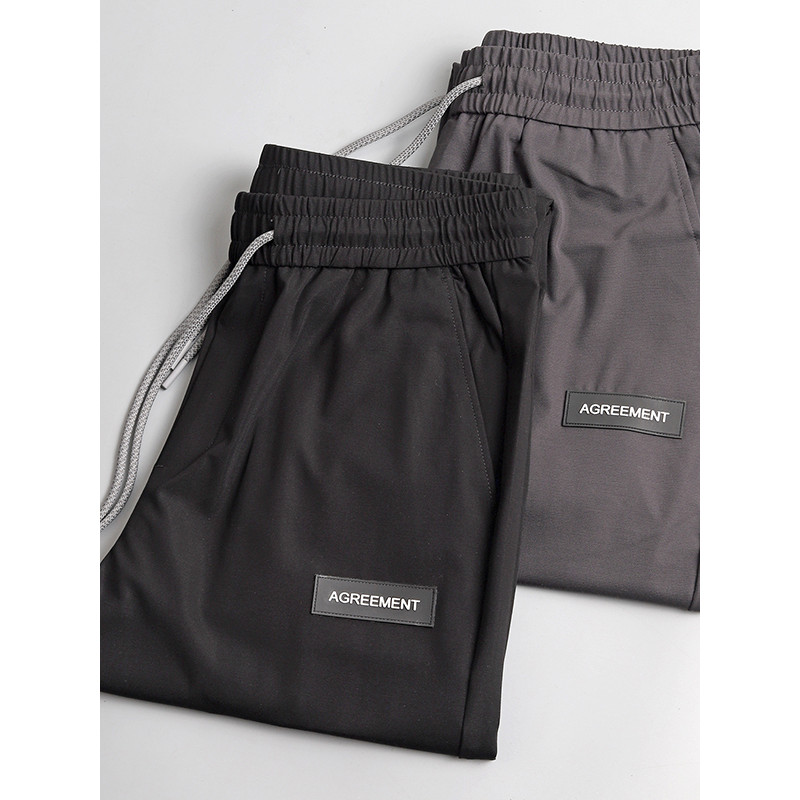 Elasticidade de seda gelada!Calças esportivas simples masculinas cintura elástica cordão Casual fino solto cor sólida ca