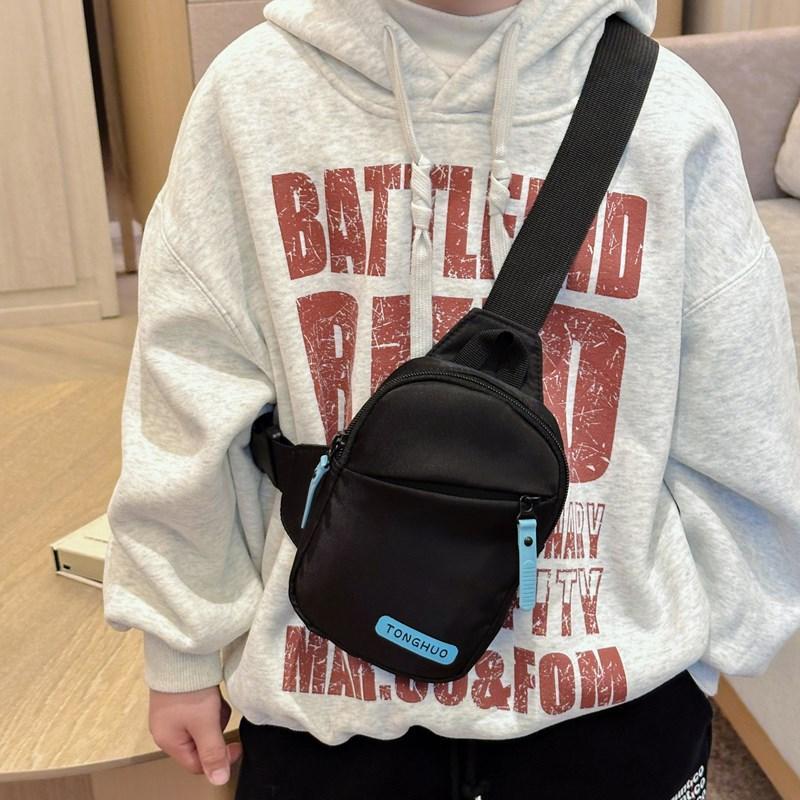 Novo estilo versão coreana bolsa de menino moda cor sólida simples Casual mensageiro mochila viagem do bebê na moda lega