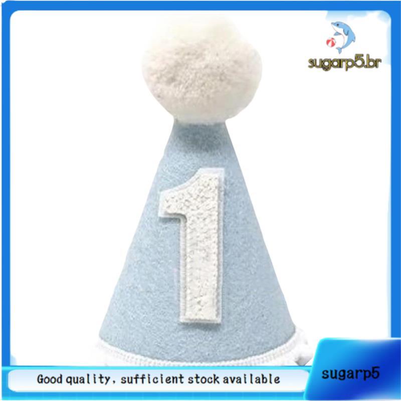 Um Chapéu De Feltro Azul Claro Com Pompons Brancos , Perfeito Para A Primeira Festa De Aniversário Do Bebê .