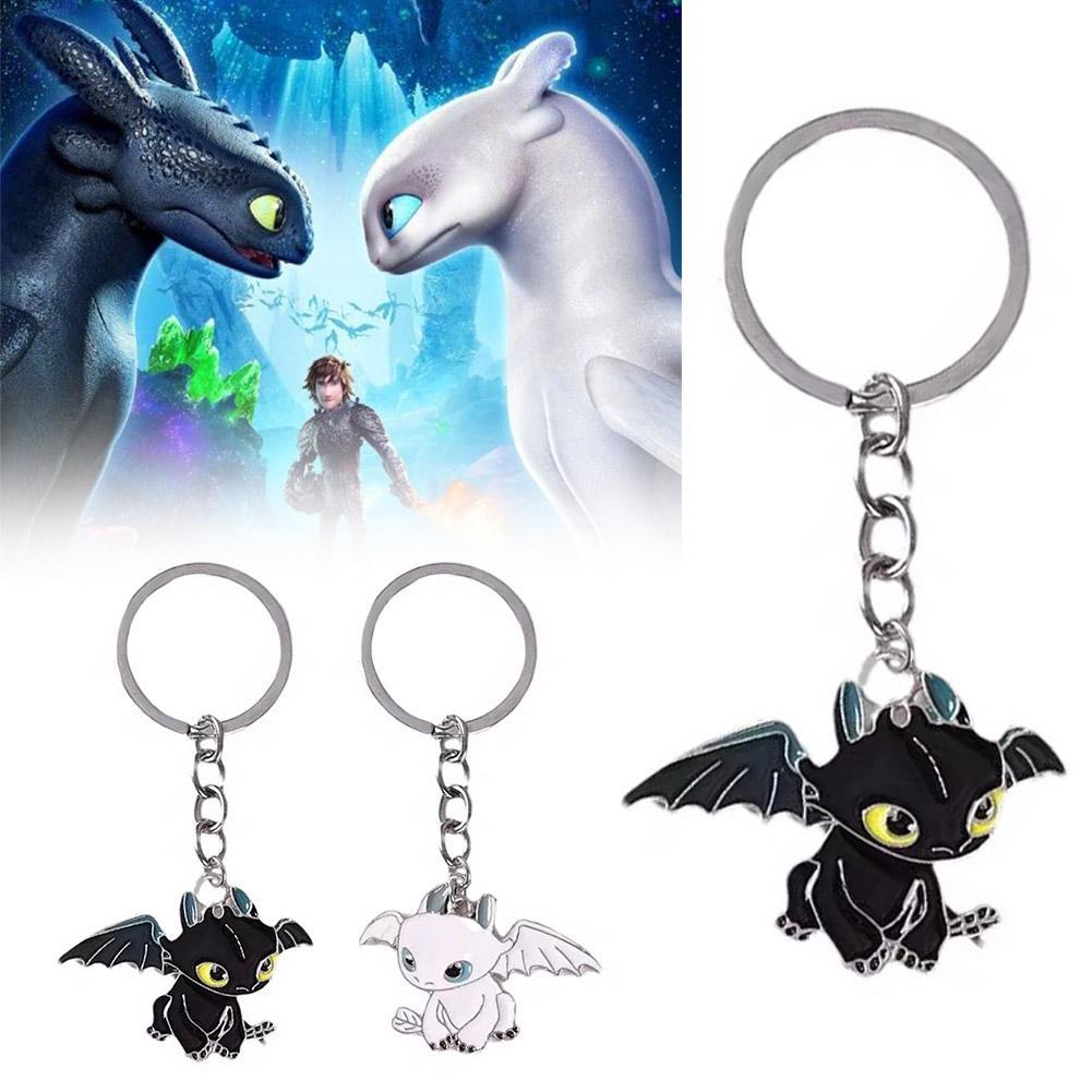 Chaveiro De Dragão Voador Desenho Animado Anime Preto Branco Esmalte Desdentado Casal Pingente