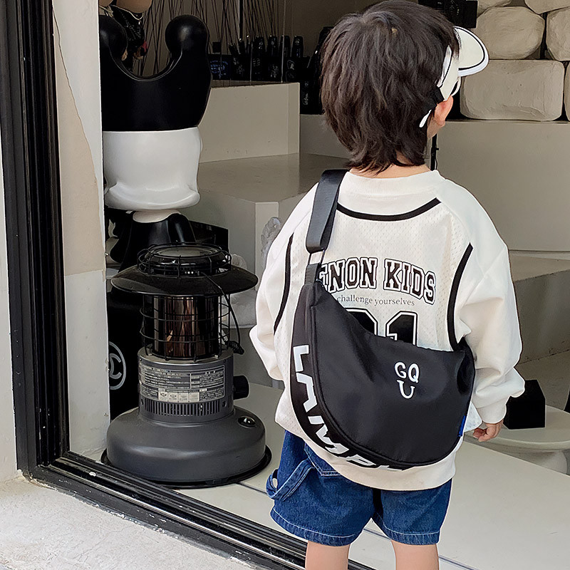 Versão coreana crianças Diagonal saco moda carta viagem bolsa de ombro menino Casual lona leve saco do bebê na moda