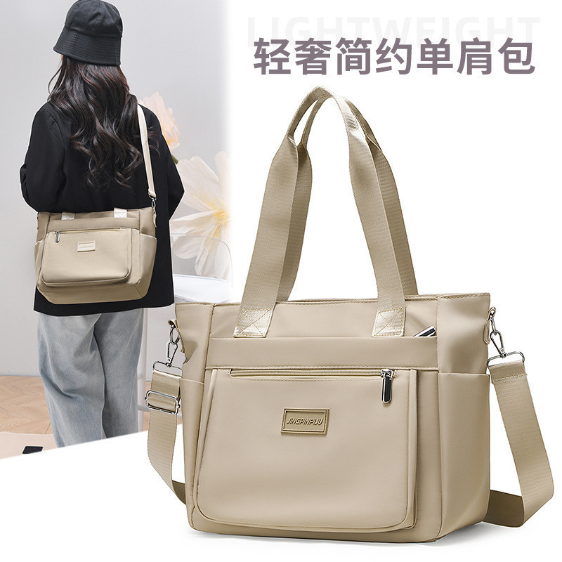 2025 novo estilo de pano de náilon leve bolsa de ombro feminina grande capacidade All-Match Casual sacola moda Commuter