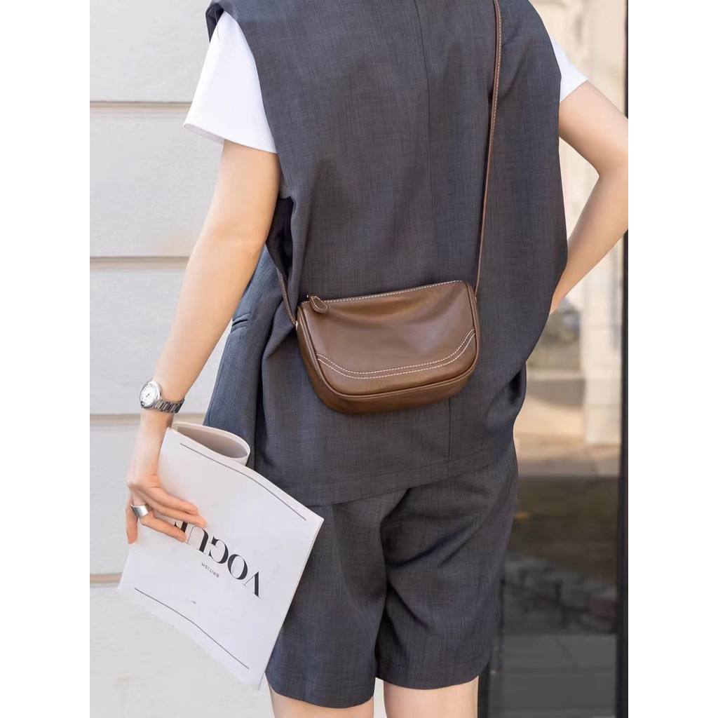 Bolsa de selim de couro curtido vegetal de primeira camada 2025 Primavera Verão Novo estilo High-End Sense Bolsa mensage