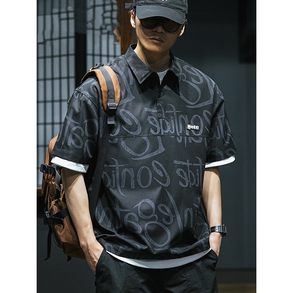 Camisa polo americana de manga curta masculina macacão de verão Street Wear solto tamanho grande meia manga fina impress