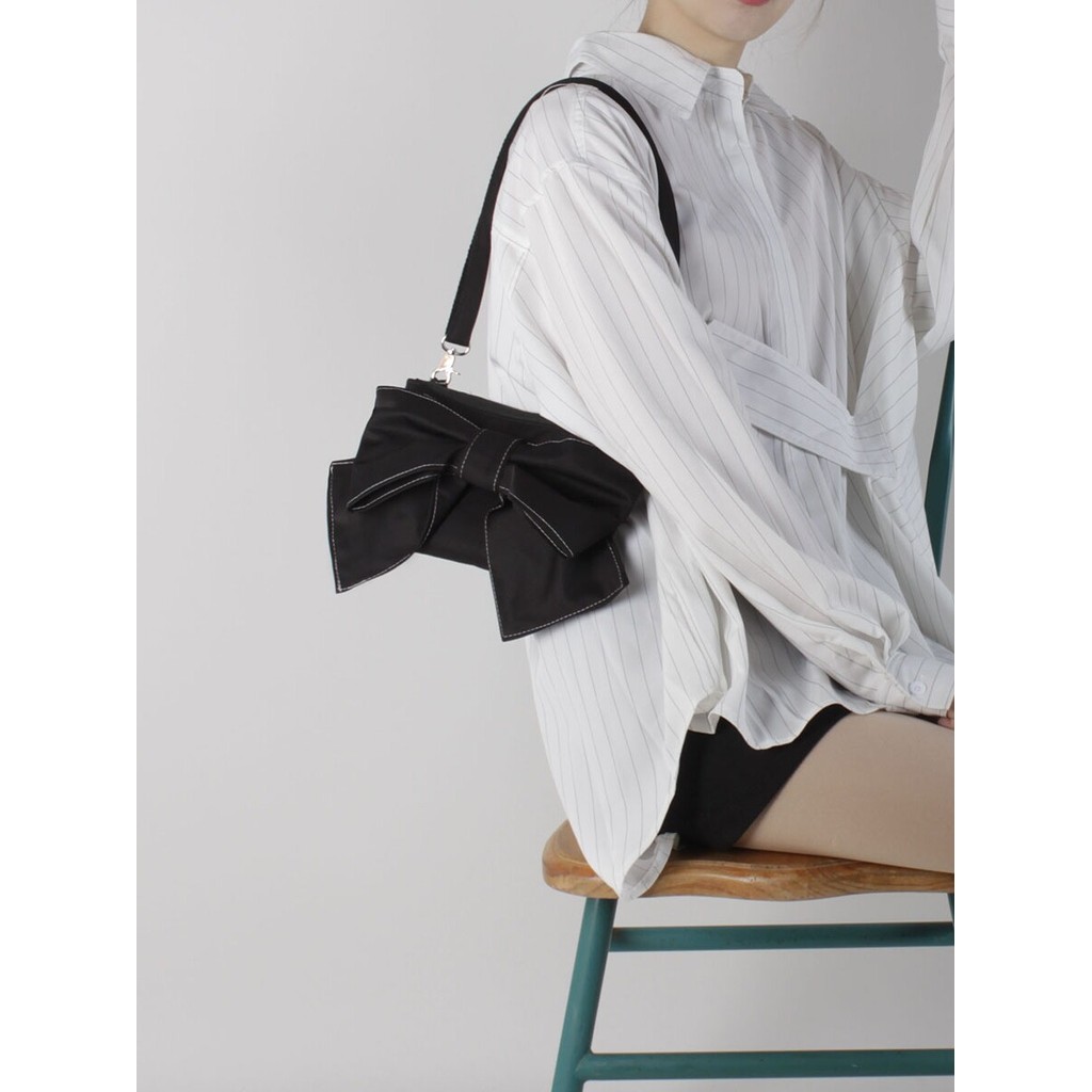 Bonito bonito macio bonito arco saco feminino nicho Design axilas saco do mensageiro Suta Original primavera verão estil