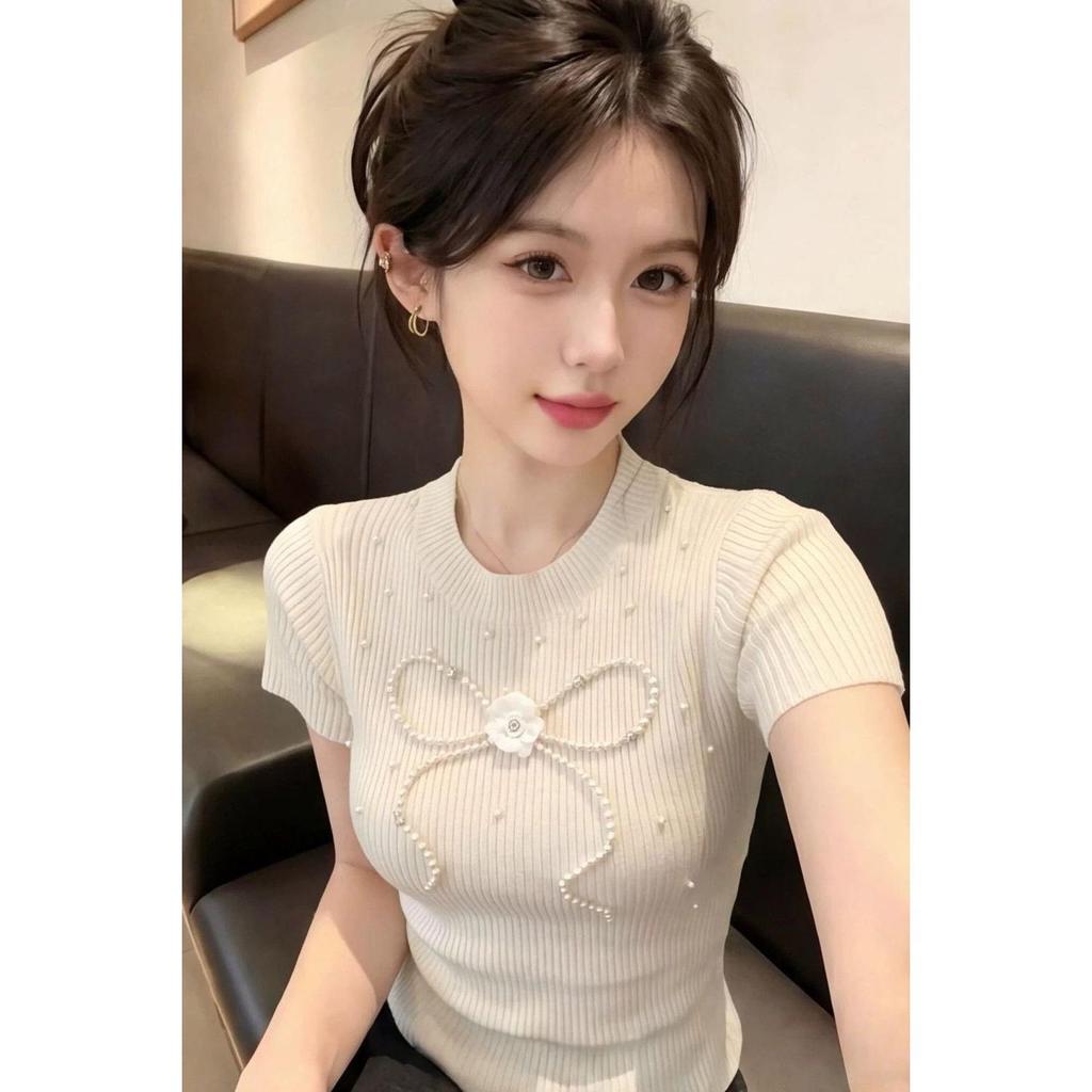 Xiaoxiang estilo indústria pesada pérola arco malha camiseta feminina verão estilo fino cintura estreita mais magro olha