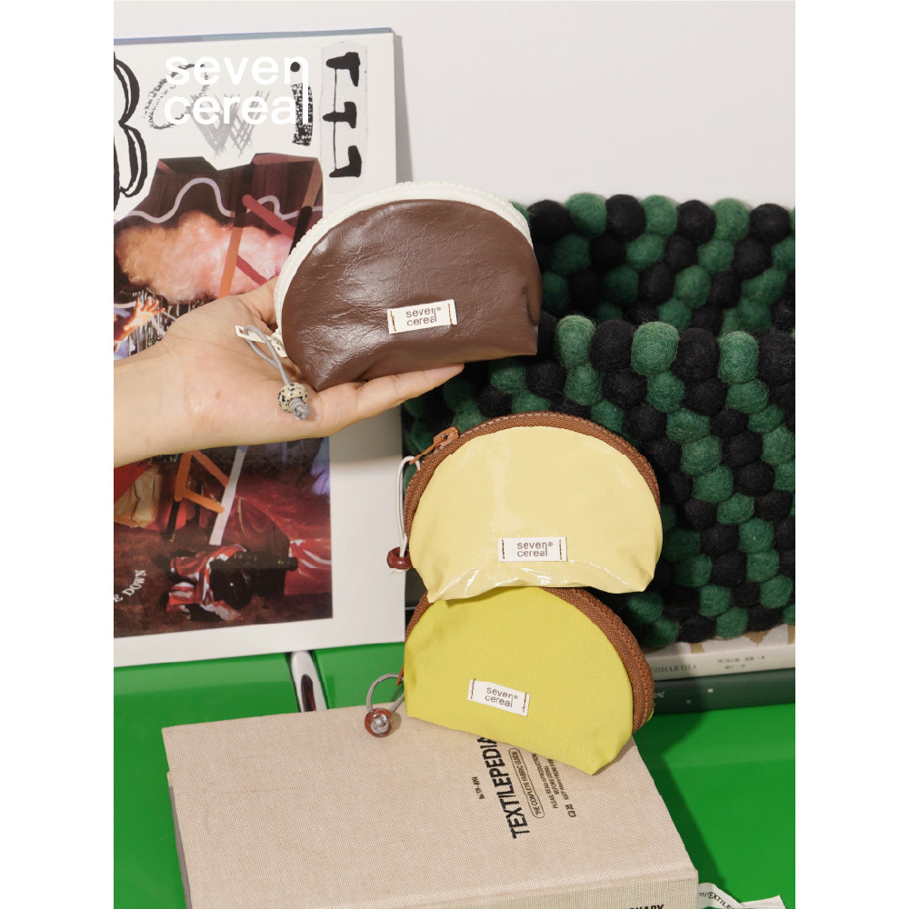 Qigu | Mini Hill Bag 2026 Nova bolsa cosmética portátil com Design à prova d'água Bolsa de armazenamento para viagem