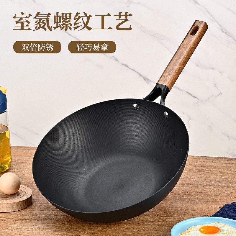 A wok doméstica da Pot Sister é uma wok tradicional de ferro fundido com fundo plano, de alto valor estético, antiaderen