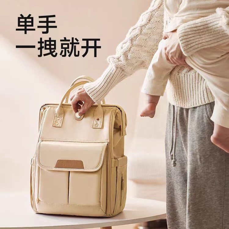 Novo estilo bolsa de mamãe bebê mãe confortável leve multifuncional mochila de grande capacidade portátil mãe bebê passe