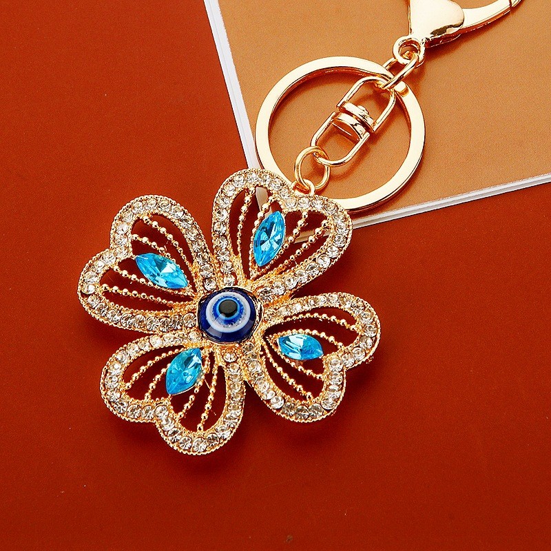 Diamante trevo de quatro folhas carro chaveiro Metal anjo olho masculino feminino saco pingente chaveiro anel Cross-Bord