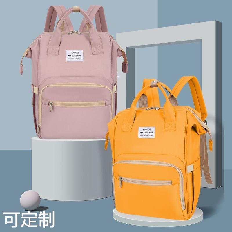Novo estilo mamãe saco multifuncional de grande capacidade mãe bebê saco bebê mãe passeio portátil espera saco moda moch