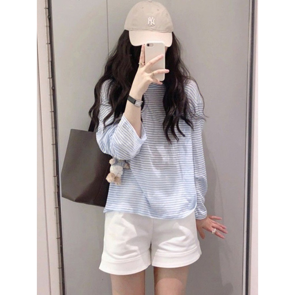 Início do outono High-End estilo fino versão coreana estilo preguiçoso camiseta feminina azul listrado de manga comprida