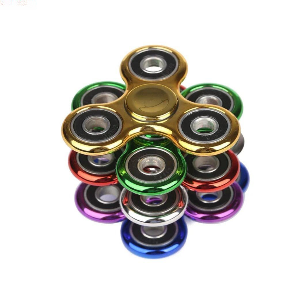 Fidget spinner, divertido spinner de mão para três dedos, brinquedo educativo para alívio do estresse.