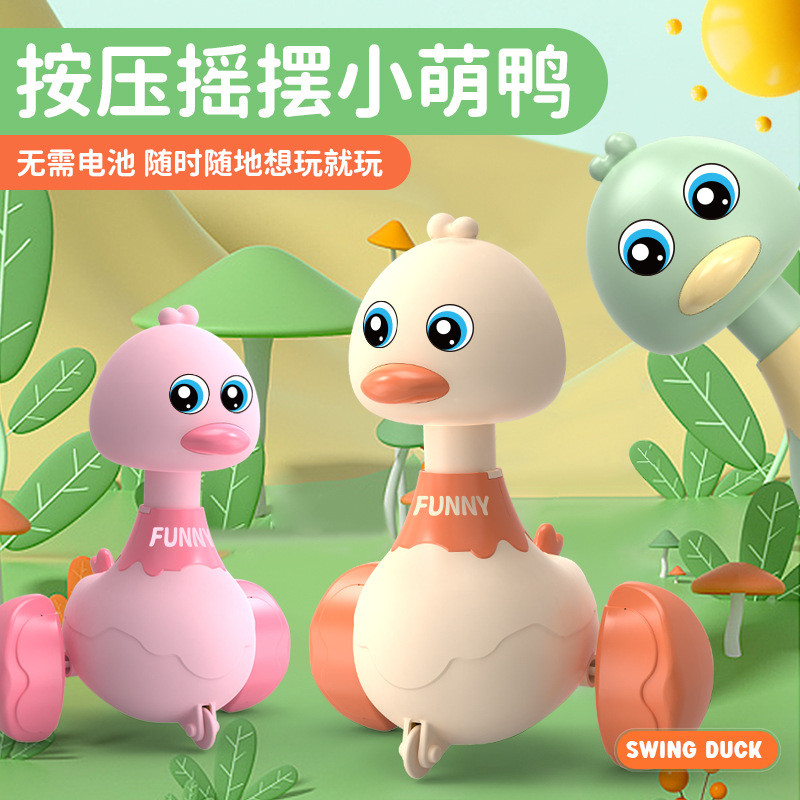 Bancada de brinquedos de Chenghai, pequenos artigos, carrinho de empurrar infantil em formato de patinho popular, atacad