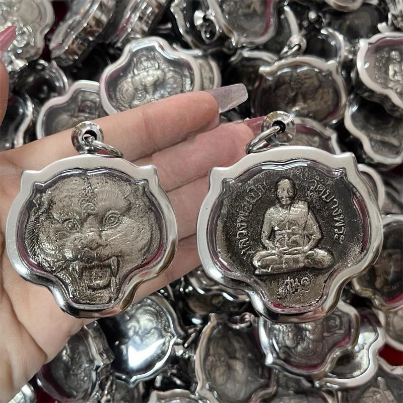 รูปสินค้า เหรียญเสือหลวงพ่อเปิ่น งานสวยพรีเมี่ยม เลี่ยมกรอบสแตนเลส