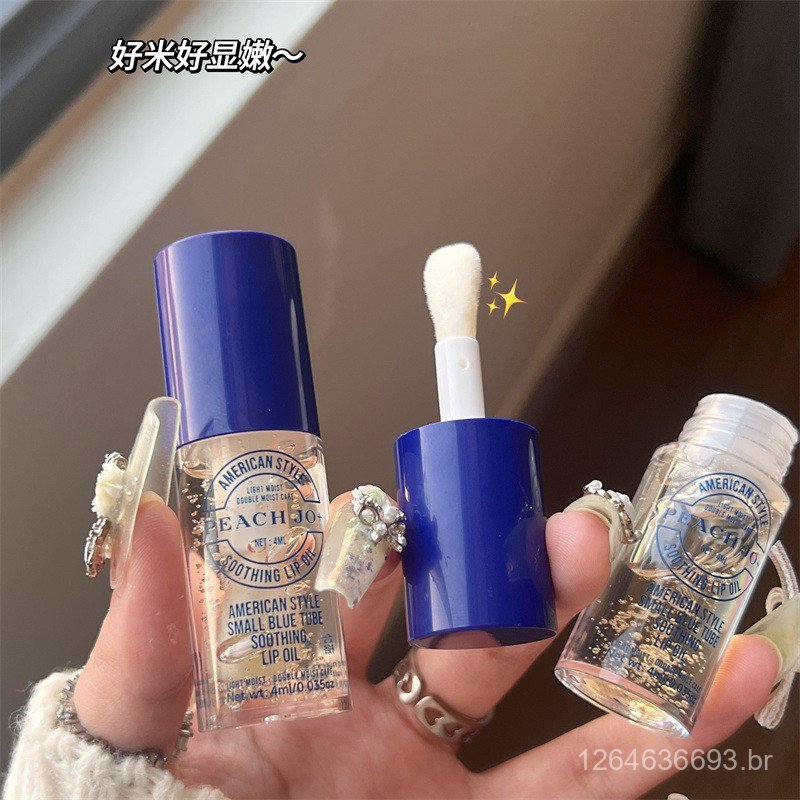 Líquido hidratante azul pequeno + óleo labial em tubo para cuidado e beleza dos lábios, cor pêssego.