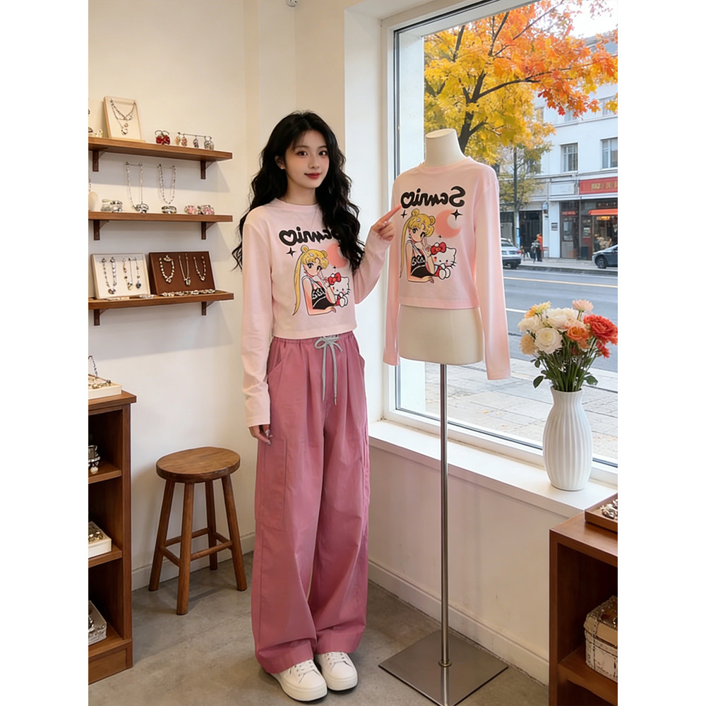 A moda Popular deste ano chique dos desenhos animados impresso manga comprida camiseta feminina primavera 2026 novo esti