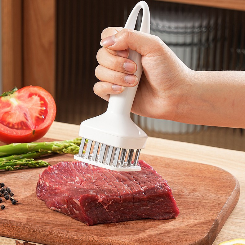 Amaciador de carne em aço inoxidável para uso na cozinha, adequado para carne bovina, frango e porco.