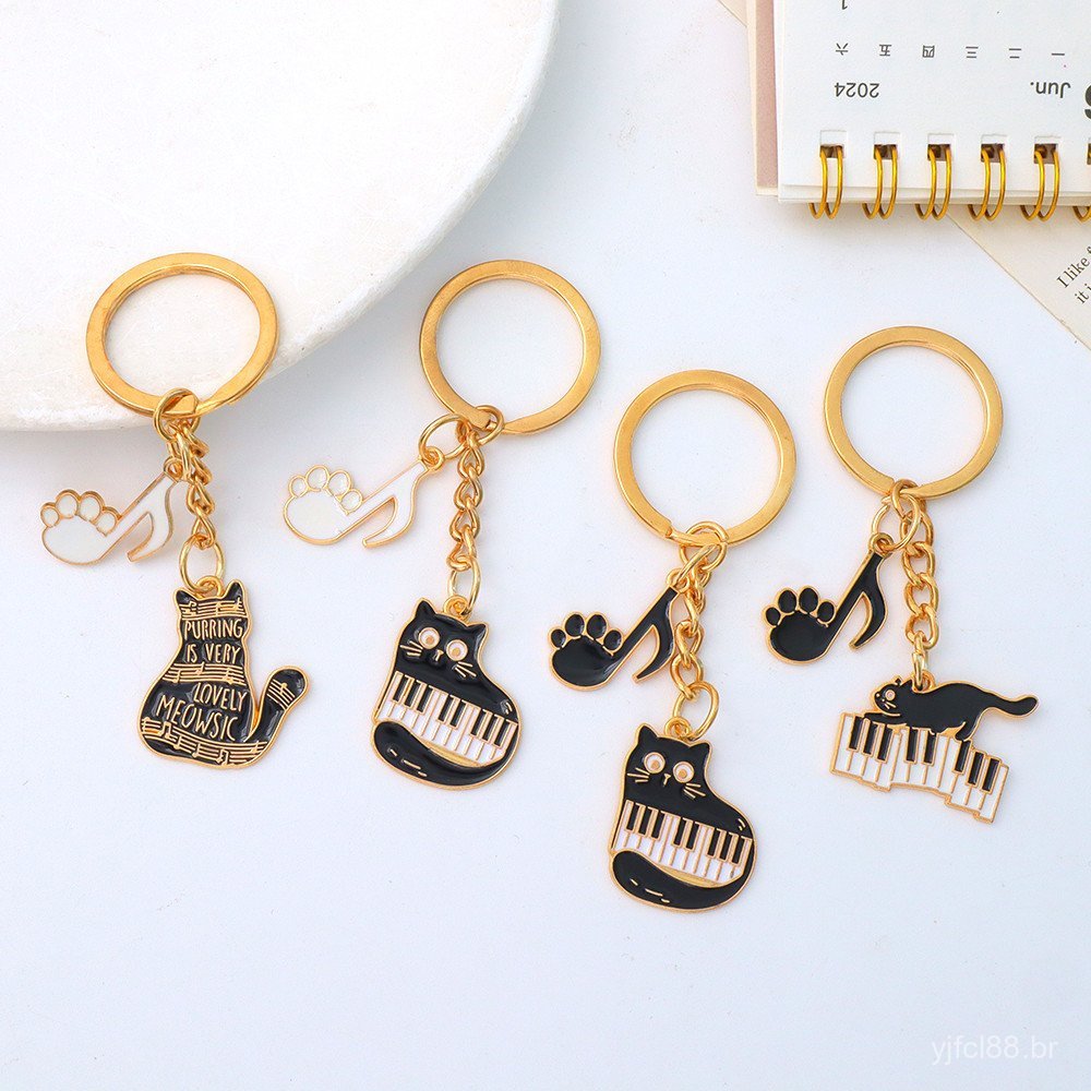 Chaveiro de gato com piano fofo, adorável gatinho com nota musical, adequado para carros, capas de fones de ouvido, bols