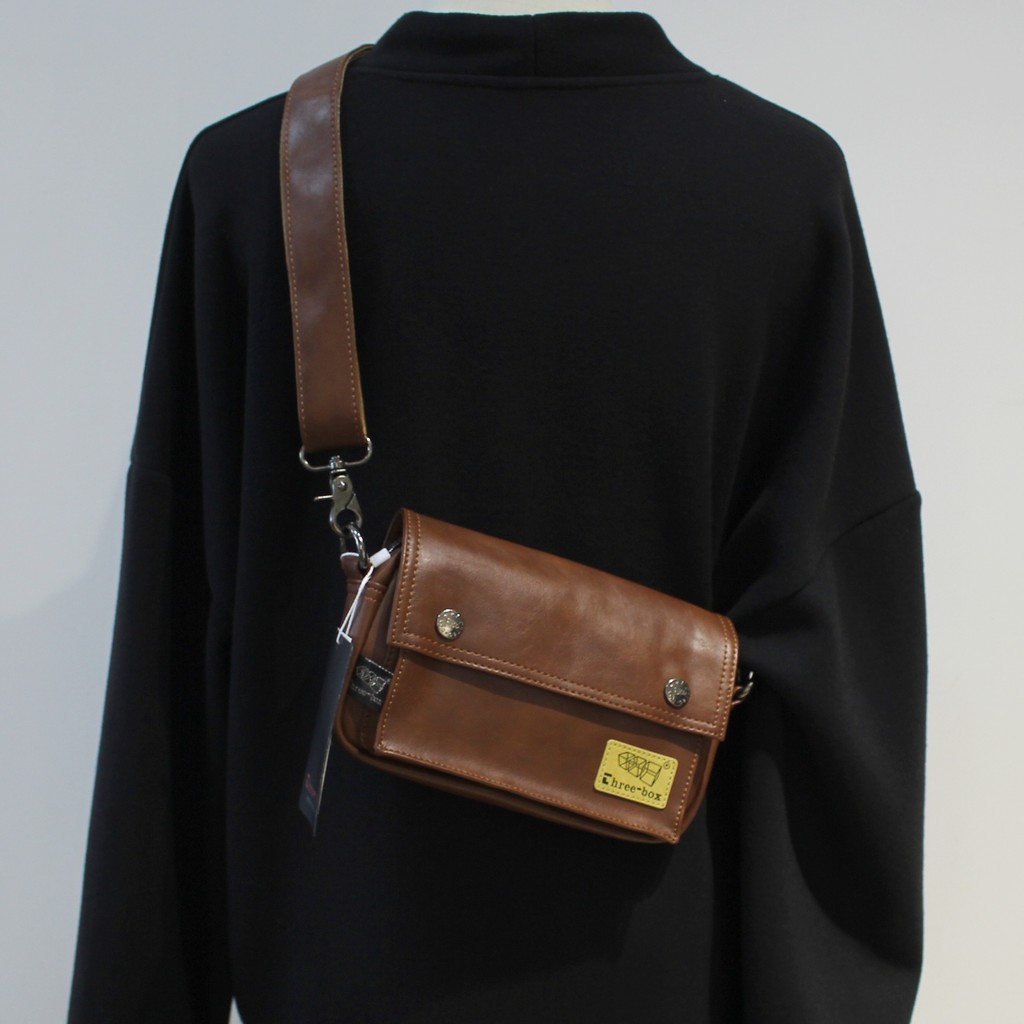 Três caixas masculinas de um ombro saco do mensageiro de couro aleta carteiro pequena mochila Street Wear Casual moda Al
