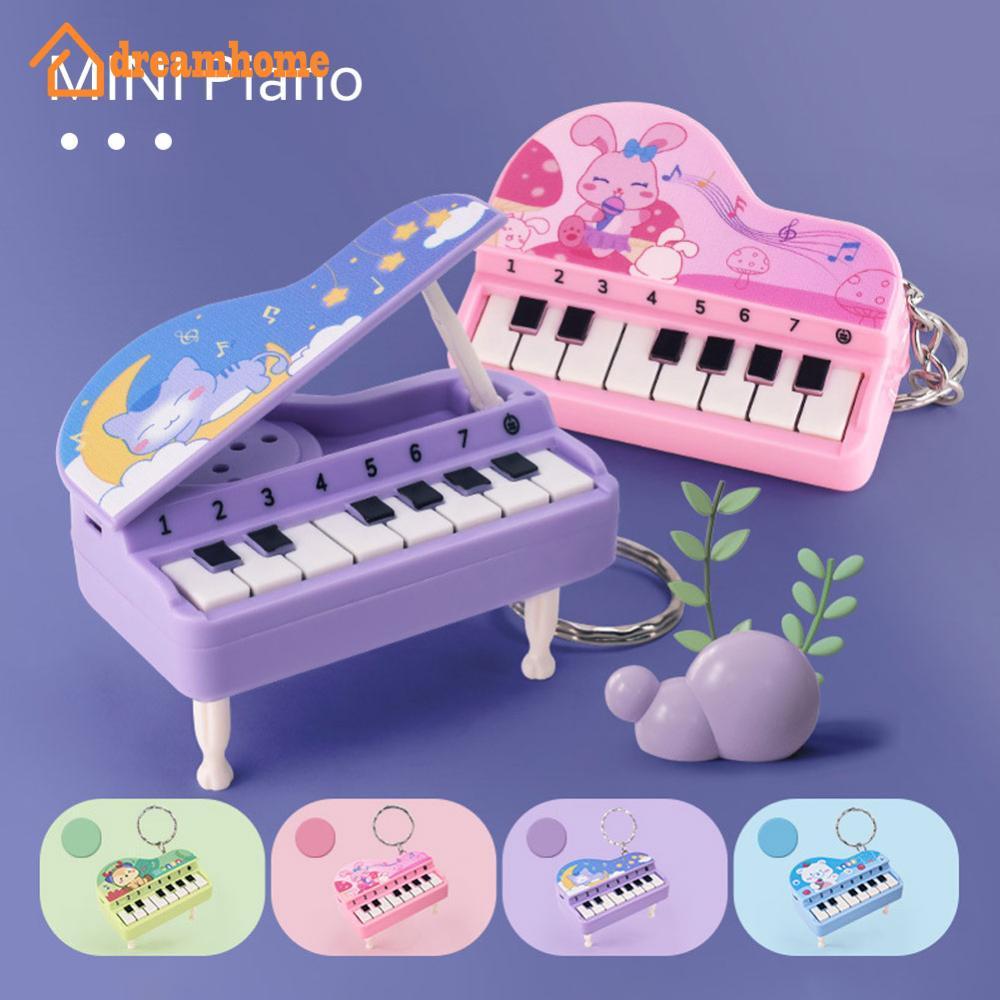 DREAMHOME Mini Piano Eletrônico Com Treinamento De Luz Dedo Chaveiro Teclado Portátil Instrumento Musical Brinquedo G1Q4