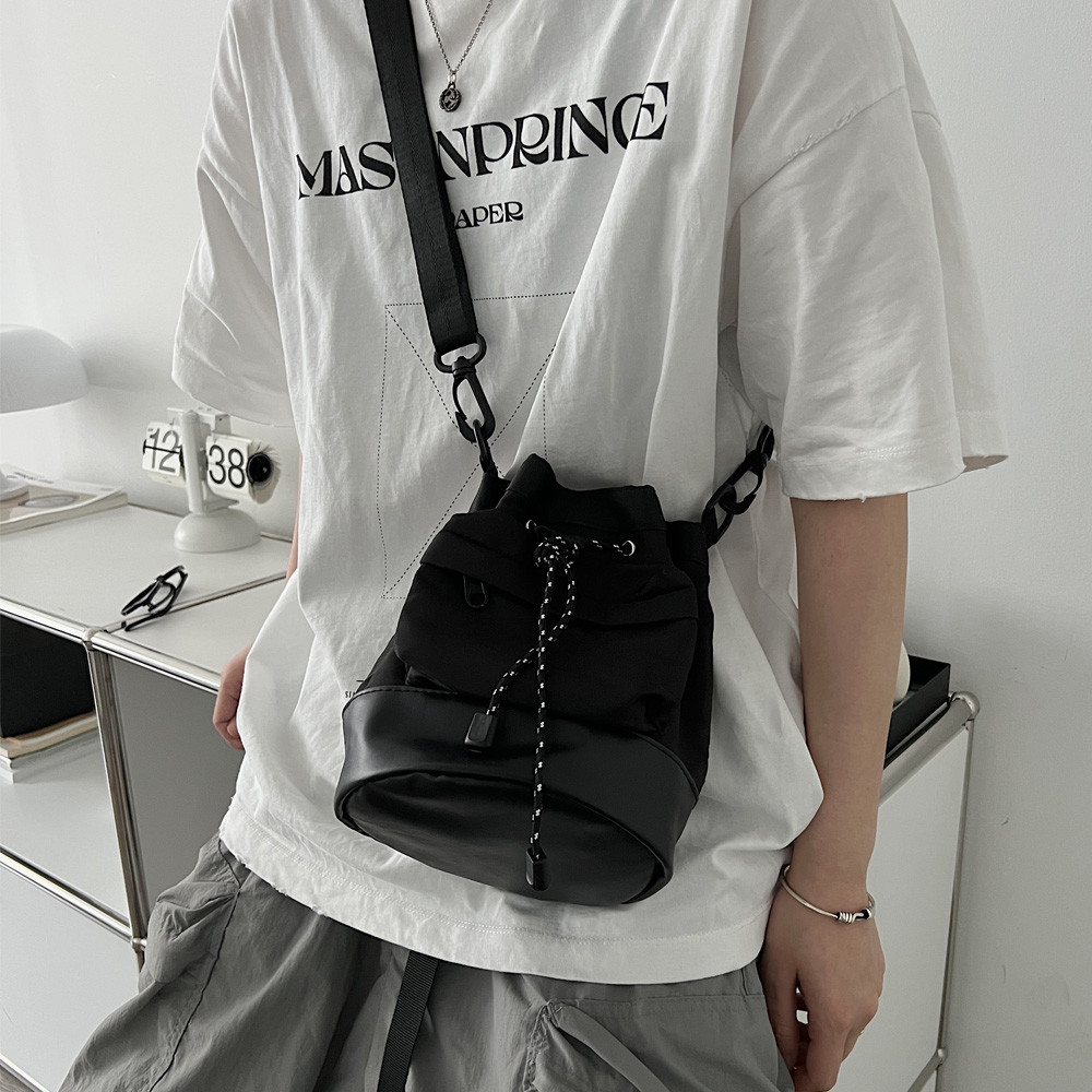 Simples estilo unissex masculino balde saco de ombro versão coreana na moda ins Casual pequena mochila cordão Crossbody 