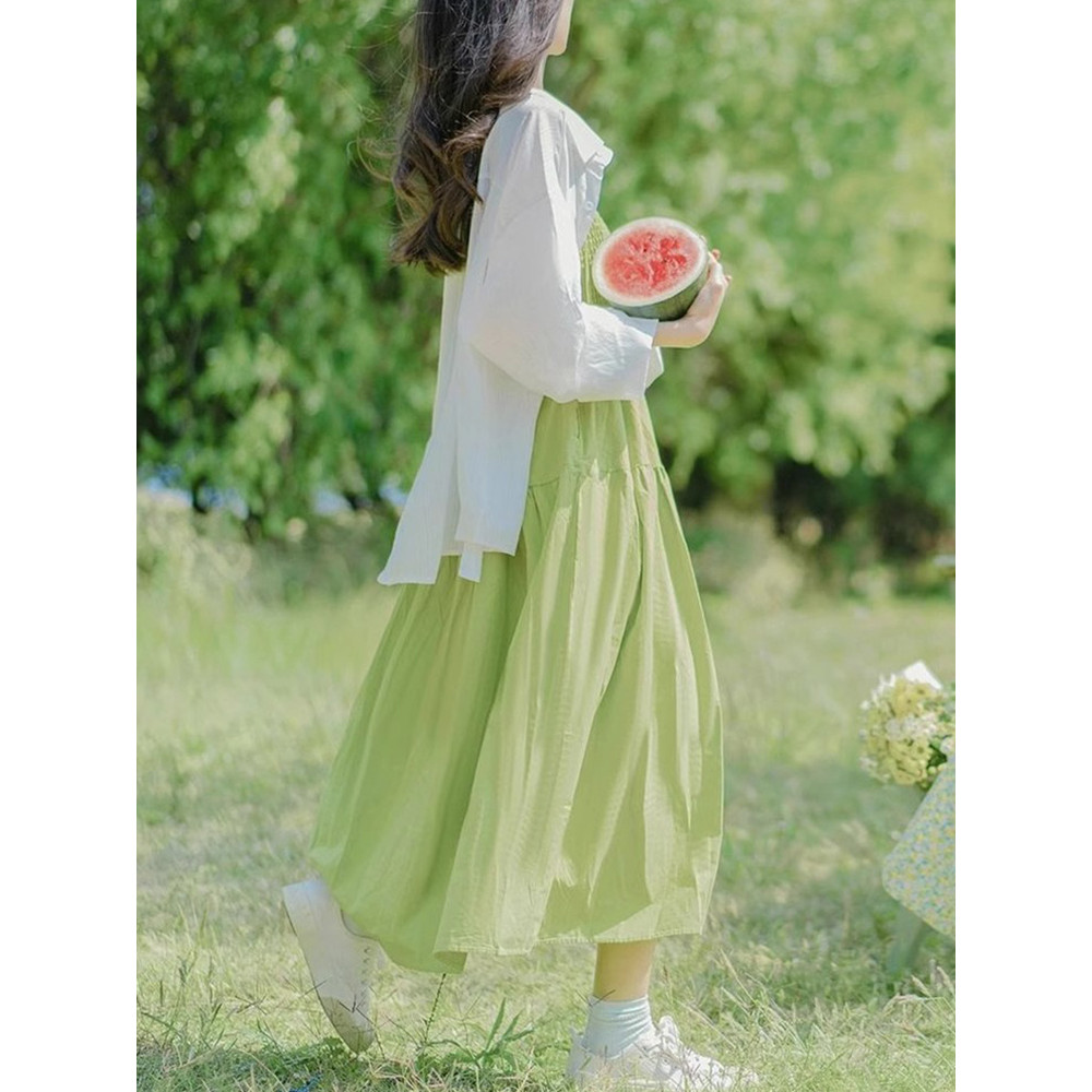 Chá Break francês verde estilingue vestido crianças verão 2026 novo estilo dopamina preguiçoso estilo férias saia longa 