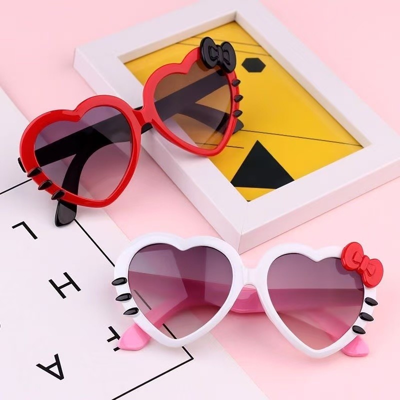 Óculos de Sol Infantil Coração com Laço 🎀 – Estilo Fofo, Divertido e Confortável em Oferta na Shopee
