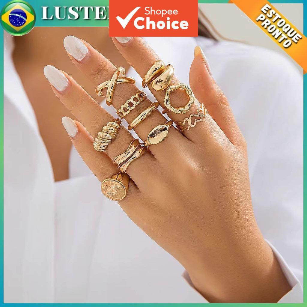 Conjunto de joias douradas luxuoso com 13 anéis redondos de design moderno, empilháveis, ideais para meninas.