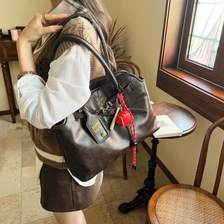 Bolsa de Viagem Vintage de Grande Capacidade para Mulheres Nova Moda Casual Bolsa Tote Niche Bolsa de Ombro Moderna em Oferta na Shopee