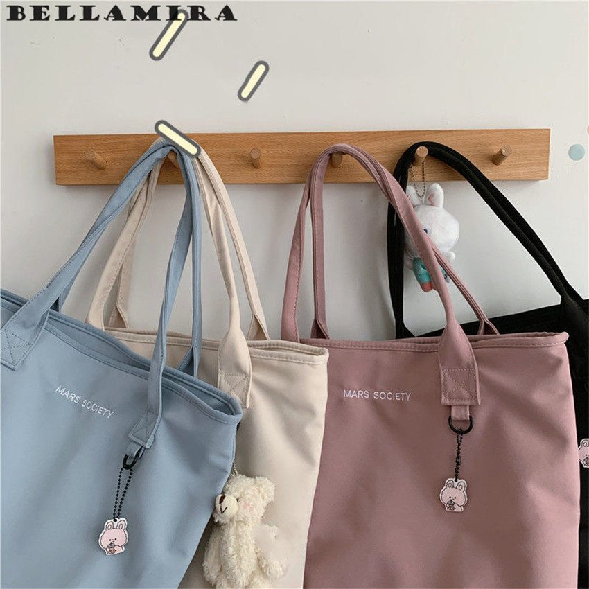 Bolsa De Ombro De Nylon Repelente De Água De Creme Bolsa De Mão De Grande Capacidade É Adequada Para Ir Para A Escola em Oferta na Shopee
