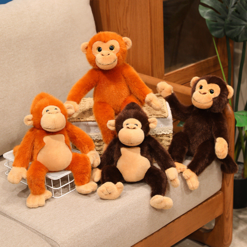 Simulação zoológico floresta tropical apontou cérebro macaco boneca de pelúcia macaco dourado orangotango macaco de braç