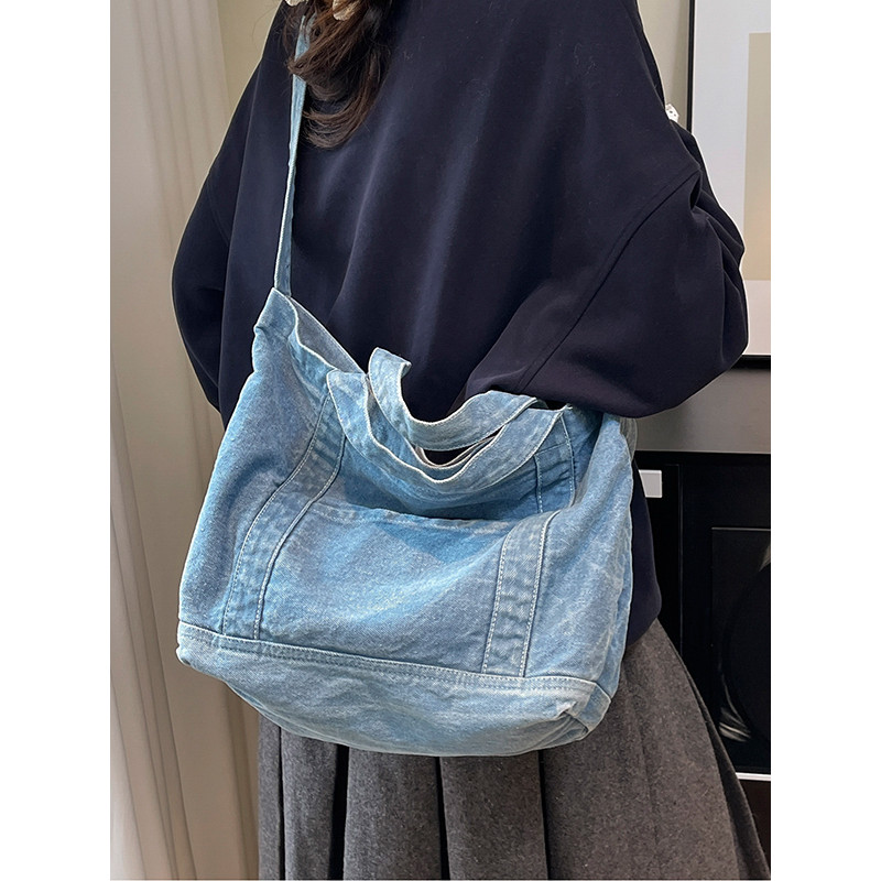 Bolsa mensageiro jeans de grande capacidade feminina 2026 novo estilo literário simples bolsa de lona bolsa de ombro