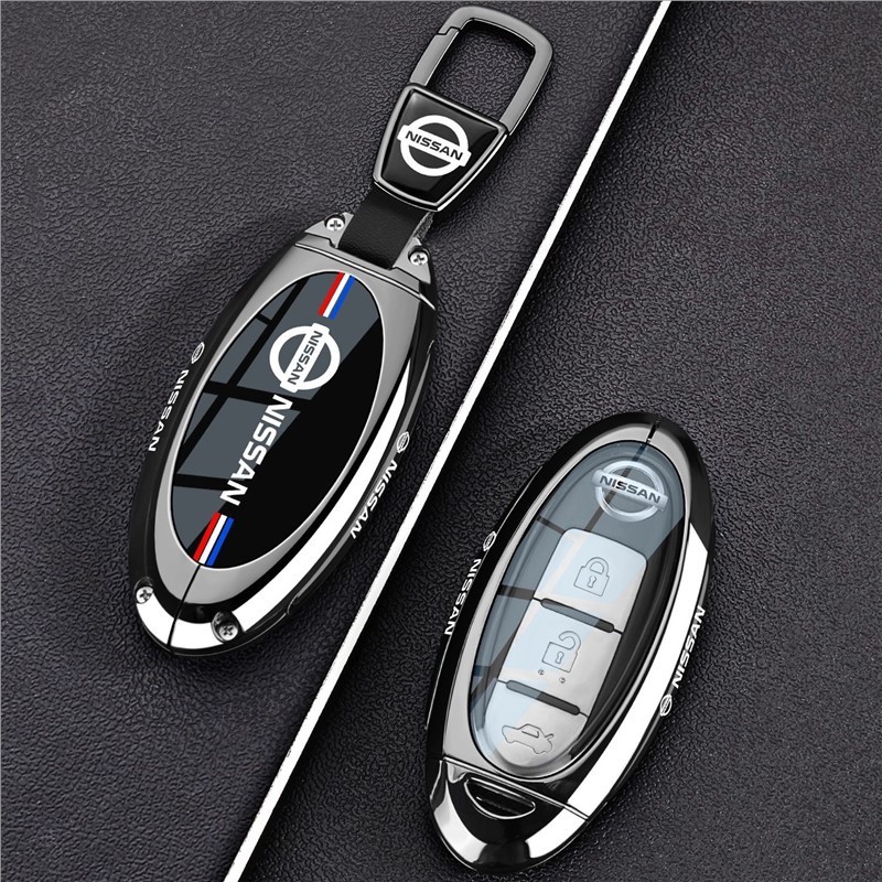 Applicable 2012 Nissan Qijun Key cover Nissan X-Trail Qashqai Qashqai Exploring the Land Rogue Car bag buckle case