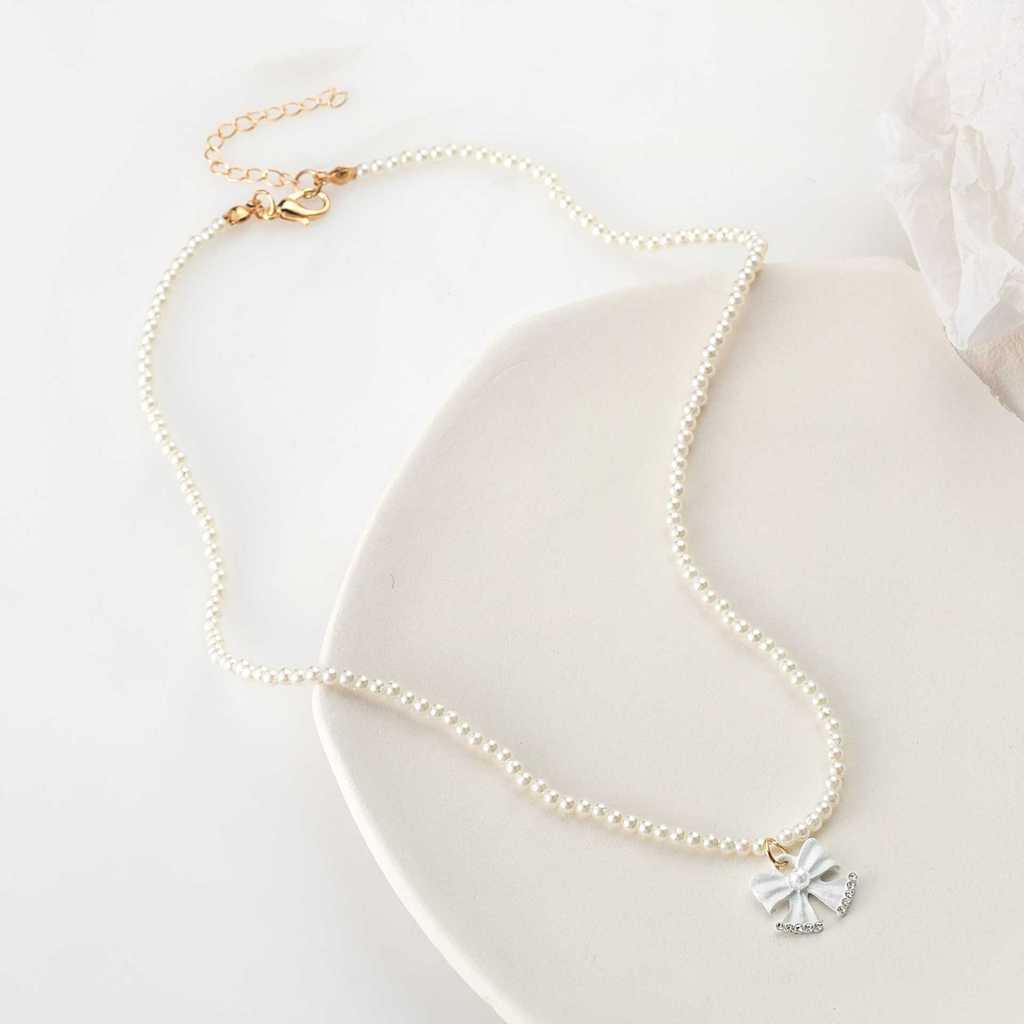 Desejo novo estilo moda colar fresco bonito pérola colar arco ponto diamante pingente colar atacado