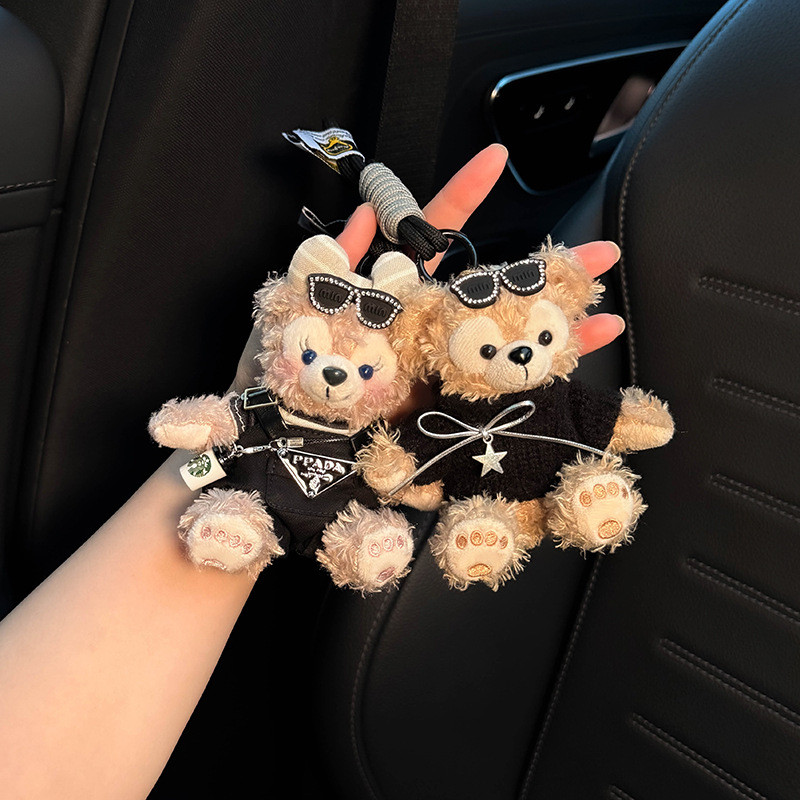 2026 novo estilo Shirley rosa Duffy saco pingente carro chaveiro pingente carro elétrico bonito boneca casal