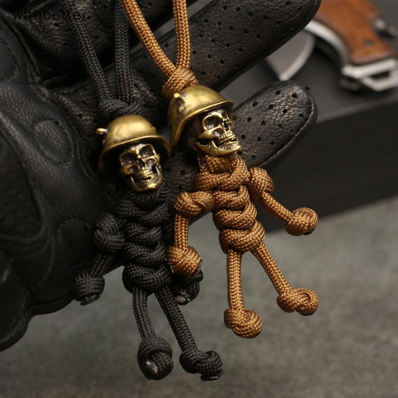1PC Crânio Cabeça Chaveiro Carro Motociclista Capacete Pingente Corda Trançada Paracord Saco Pendurado Bapa Boneca Brinq