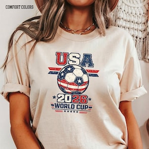 Camiseta Masculina Feminina Oversized Estampa Copa do Mundo 2026 EUA Bola de Futebol Estampa Retrô Camiseta Streetwear