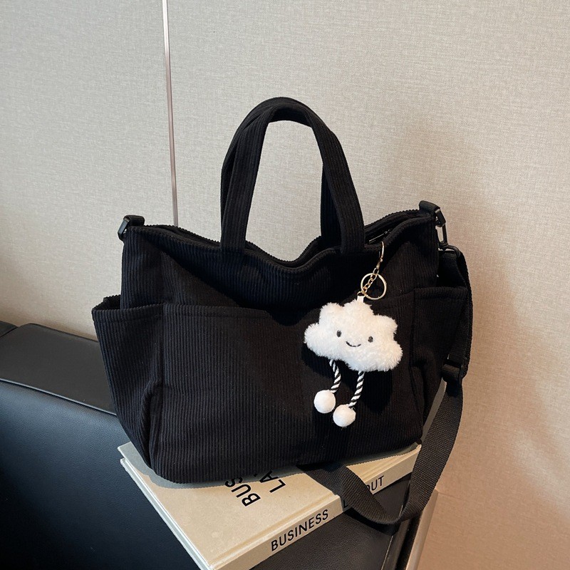 Bolsa Feminina Cotelê Coreana Grande Capacidade Ombro Transversal Casual com Pingente em Oferta na Shopee