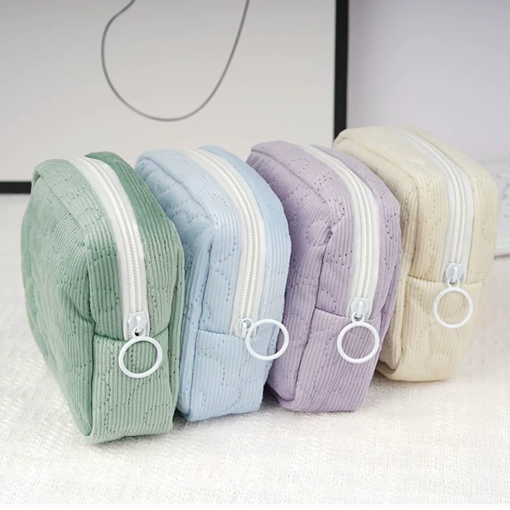 Mini necessaire de tecido com estampa em alto relevo de flor em Oferta na Shopee