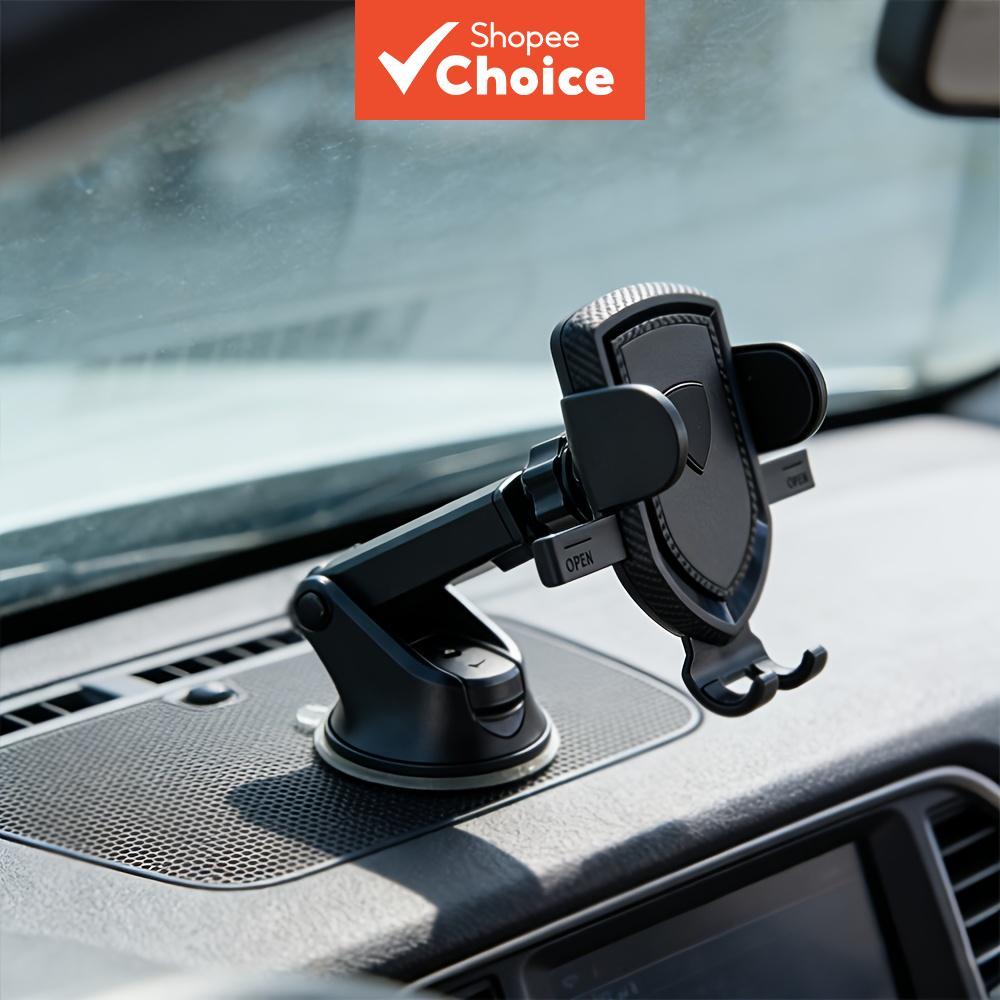 Este é um suporte de telefone automotivo com sensor de gravidade, instalado no painel de instrumentos central do carro.