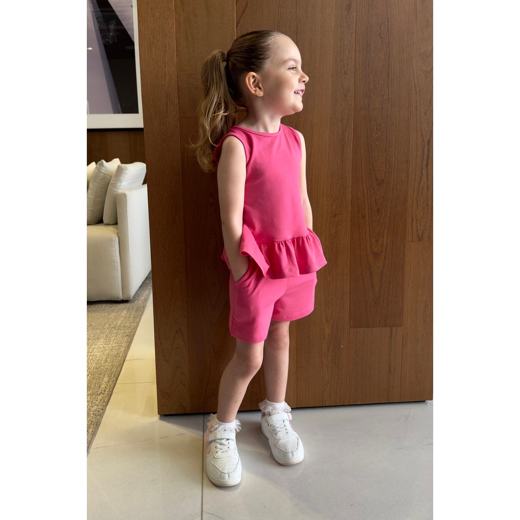 Conjunto Infantil Pink Blusa Peplum Detalhe Aberto Laço Costa Shorts Bolsos Funcionais
