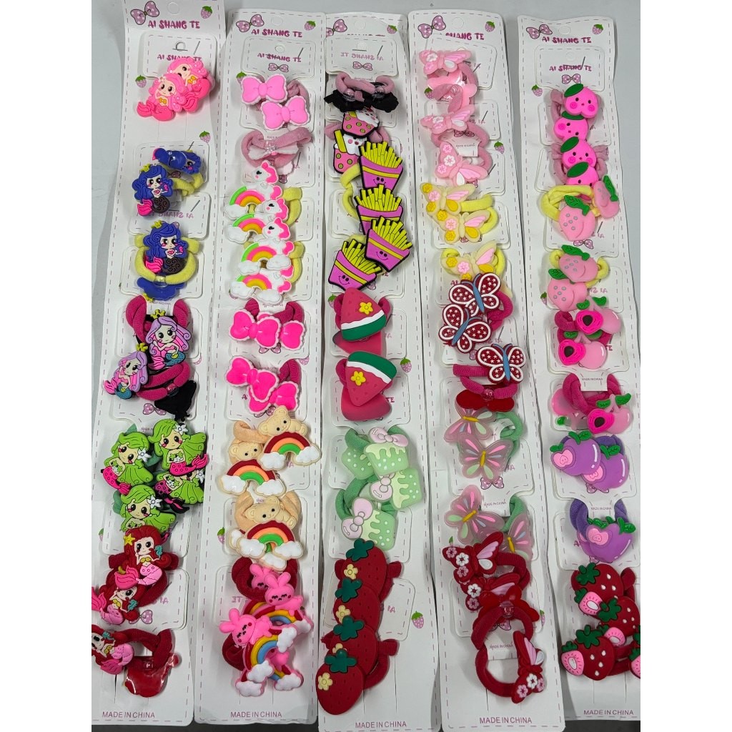 Kit 10 - 40 unidades de xuxinhas com Detalhes de Silicone muitos Modelo Aleatorio em Oferta na Shopee