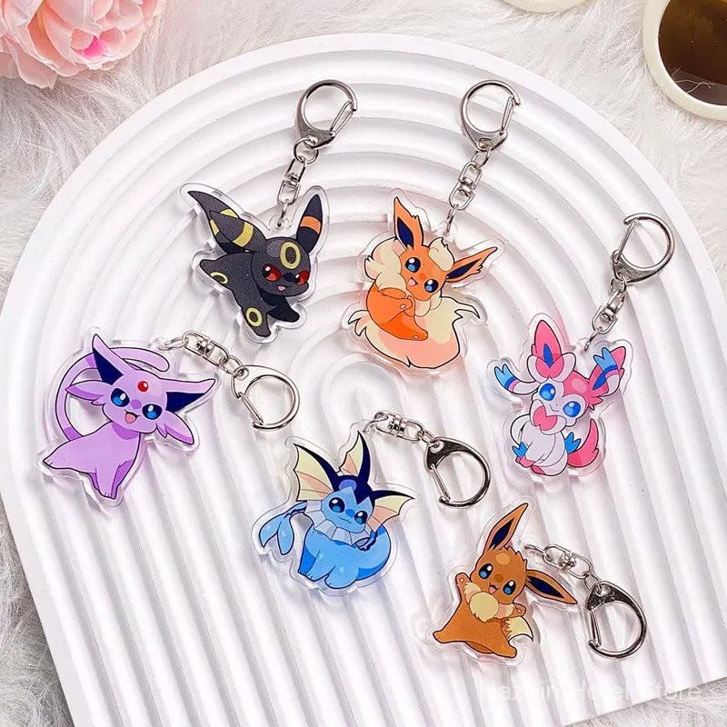 Chaveiro de Acrílico Pokémon Eevee Acessórios Pikachu Charizard Charme de Bolsa Pingente de Mochila Fofo Anel de Chave E em Oferta na Shopee