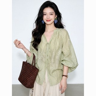 Temperamento francês preguiçoso verde Floral lanterna manga camisa feminina 2026 início da primavera Super quente reduçã