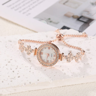 Relógio feminino criativo e elegante, com pulseira ajustável em formato floral redondo.