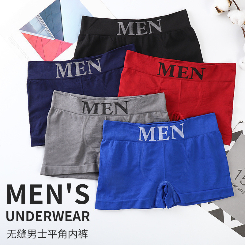 Nova roupa íntima masculina de cintura média, design sem costuras, cuecas boxer masculinas respiráveis e elegantes.